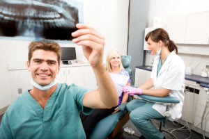 dentist with the patient